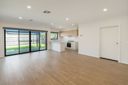 Spacious Family Home with Three Living Areas & 6.6kW Solar Panels! - Photo 4
