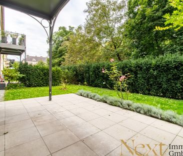 Charmante 2,5-Zimmer-Wohnung mit gemütlichem Eigengarten im Palais ... - Photo 1