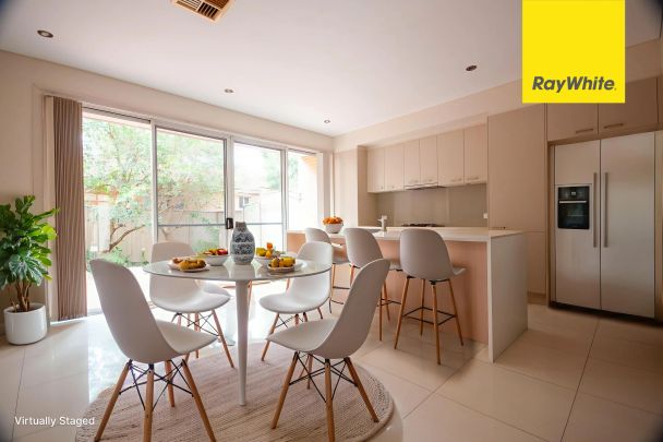 CONTEMPORARY THREE BEDROOM TOWNHOUSE IN MOST SOUGHT AFTER LOCATION - Photo 1