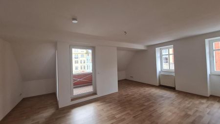 2-Raum-Wohnung DG mit Loggia - direkte Marktlage in Finsterwalde - Photo 2