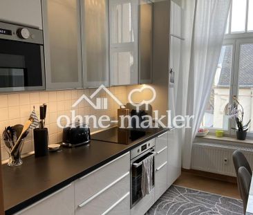 Modernisierte 2-Zimmer-Wohnung m. Luxus-Einbauküche und Blick auf d... - Foto 1