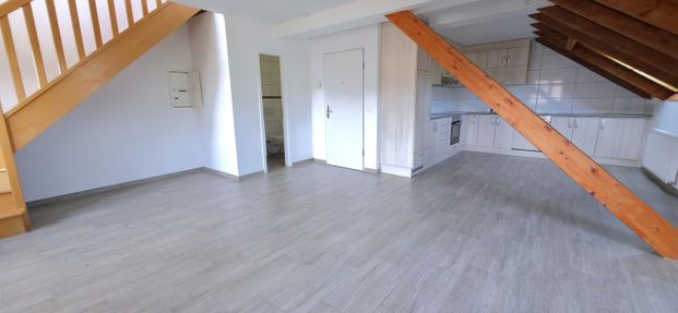 Rent a 2 ½ rooms duplex in Courchapoix - Photo 1
