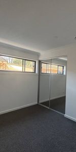 Stylish & Spacious Townhouse Living in a Prime Location - Photo 3