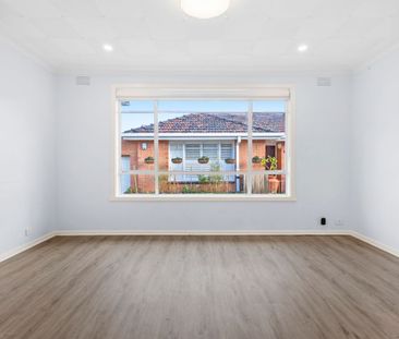 Clean, Low-Maintenance Living in a Tidy Block of Six - Photo 6