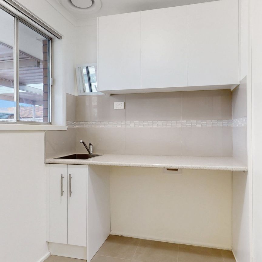 Spacious Family Home with Modern Features and Prime Location - Photo 1