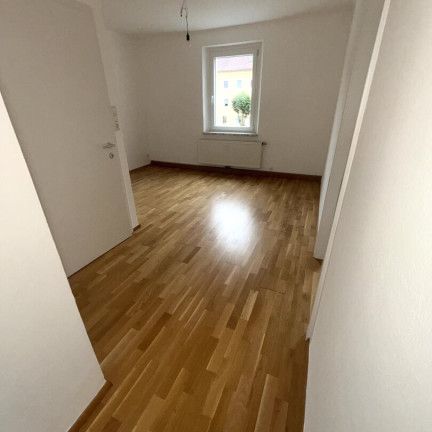Sonnendurchflutete 2-Zimmer-Wohnung mit herrlichem Grünblick im beliebten Münichholz – hochwertig saniert, mit modernem Wohlfühlbad, praktischen Wohnräumen und perfekter Anbindung! - Foto 1