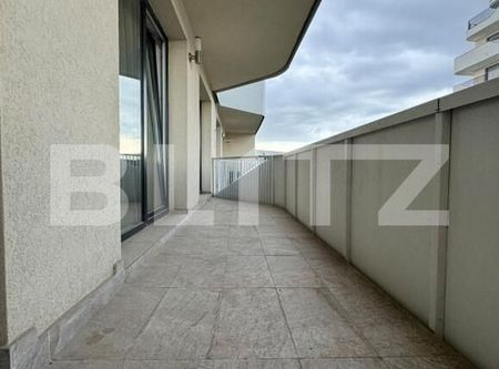 Apartament cu 2 camere, semidecomandat, parcare subterana - Photo 2