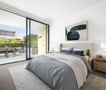 IMMACULATE OVERSIZED GARDEN APARTMENT IN TRANQUIL SETTING - Photo 5