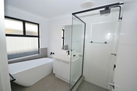 Large Four Bedroom Home with Powered Workshop! - Photo 2