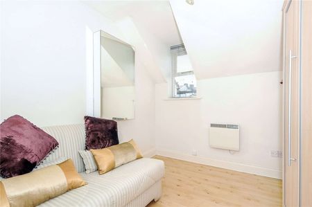 A top floor two bedroom flat just off Eton High Street with one allocated parking space. - Photo 3
