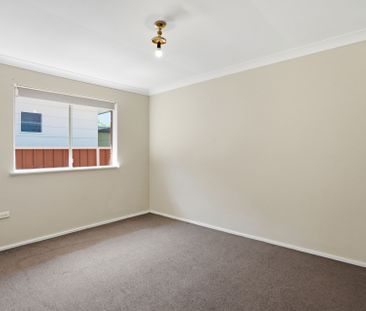 Peaceful Coastal Living Close to Shops & Beach - Photo 1