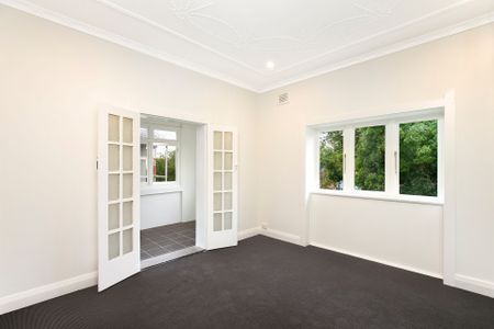 Two Bedroom Apartment with Sunroom Filled with Charm and Character - Photo 4