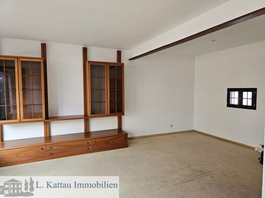 M 08 LESUM -renovierungsbedürftiges Reihenmittelhaus mit einer Garage in ruhiger Lage - Photo 1