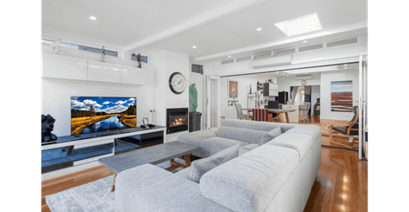 Stylish Family Haven with Designer Renovations & Versatile Studio Garage - Photo 2