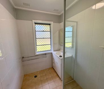 Neat & Affordable Four-Bedroom Home - Photo 4