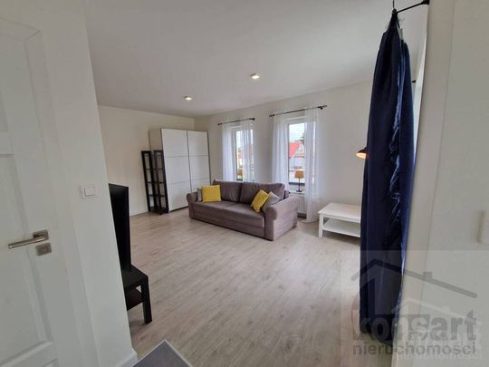 Dwupoziomowe mieszkanie przy ul. Okulickiej - Zdjęcie 1