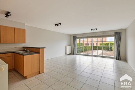Ruim 2-slpkappartement (gelijkvloers) met tuin en garage - Foto 3