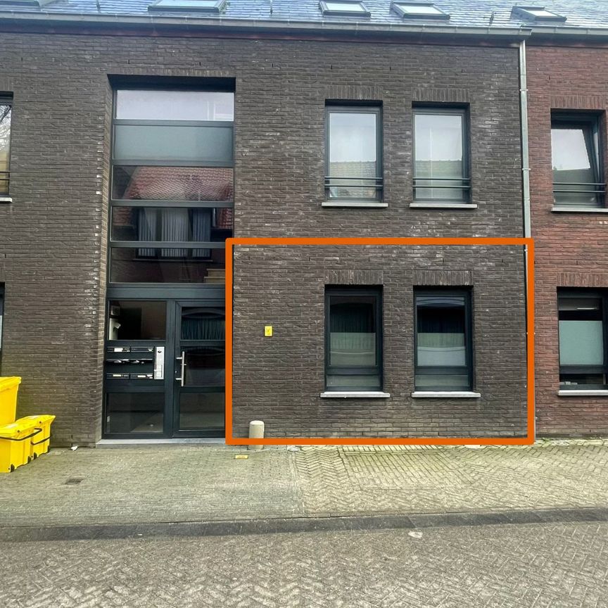 Gelijkvloers appartement met garagebox en tuin - Foto 1