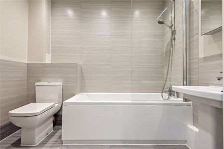 Forming part of an impressive building, this exceptionally stylish apartment has been finished to a very high specification throughout. - Photo 5