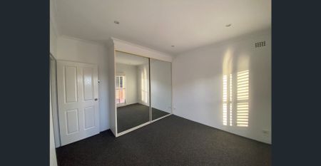 Modern Unit with Garage in Convenient Location - Photo 2