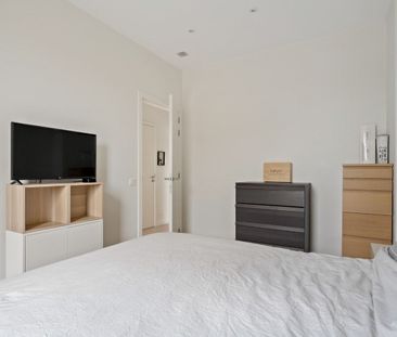 Instapklaar app. op 1ste verd. met 2 slpk., terras en autostaanplaats - Photo 5