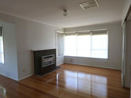 Neat & Modern 3-Bedroom Home with Low Maintenance Yard - Photo 5