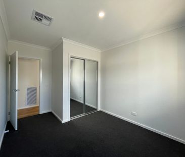 FOUR BEDROOM HOME - LOW MAINTENANCE! - Photo 2