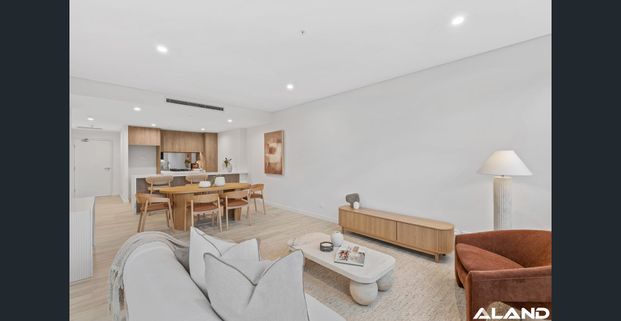 Top-Floor Two Bedroom | Rare Layout with Seamless Indoor-Outdoor Living - Photo 1