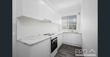 RENOVATED ONE-BEDROOM UNIT - Photo 2