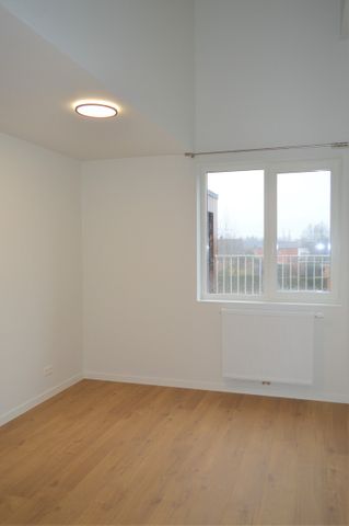 Modern appartement met terras, staanplaats en lift - Photo 3