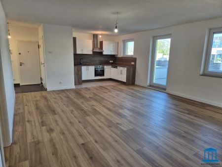 Terrassen-Wohnung im Erdgeschoss mit Einbauküche und bis zu zwei PKW-Abstellplätzen / Top 2 - Photo 2