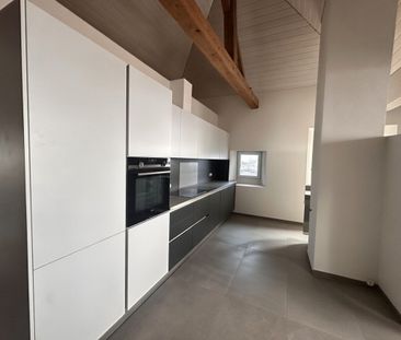 Beautiful attic apartment with character - Photo 1