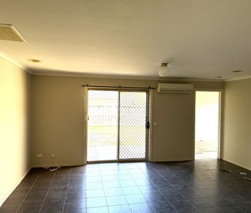 Located in a quiet street, close to schools, shops & freeway - Photo 3