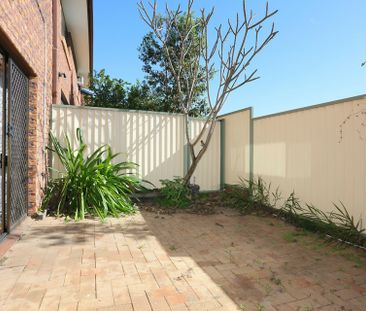 CENTRALLY LOCATED TOWNHOUSE - Photo 1