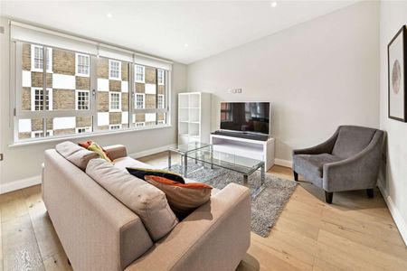 This is a very impressive modern Westminster development set in a discreet gated mews. The property comprises: 2 bedrooms, 2 bathrooms, reception, open plan kitchen, garaged parking. - Photo 3