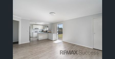 Versatile Spacious Family Home with Multiple Living Areas in Centenary Heights - Photo 2