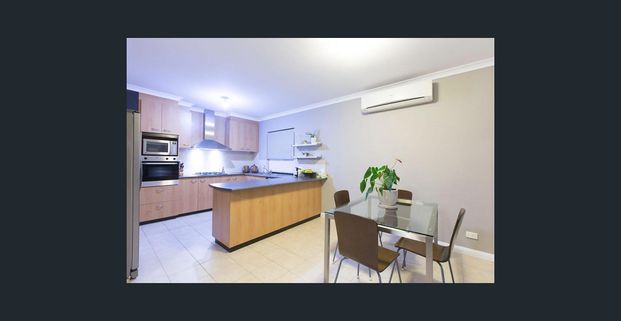 Comfortable 3x2 Home with Double Garage & Private Courtyard - Photo 1