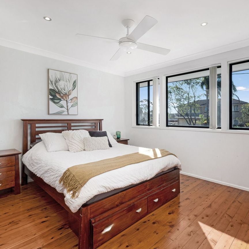 Renovated, Sun-Lit and Spacious Three Bedroom Home - Photo 1