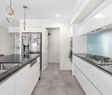 Spacious Family Home with Multiple Living Areas, Ducted Air & Garde... - Photo 6