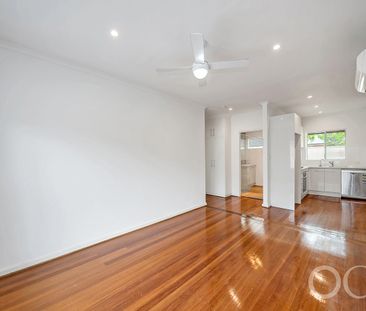 Open the Door to Light-Filled Living with a Private Courtyard Retreat - Photo 1