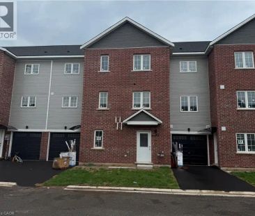 107 HIGHRIVER Trail Unit# (Main) — 4 Bedroom - Photo 1