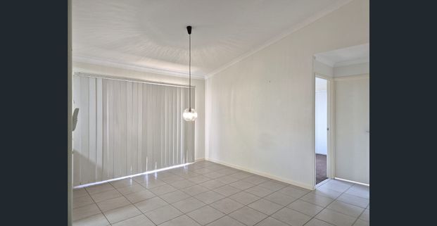 NEAT AND TIDY BRICK UNIT IN SECURE COMPLEX - Photo 1