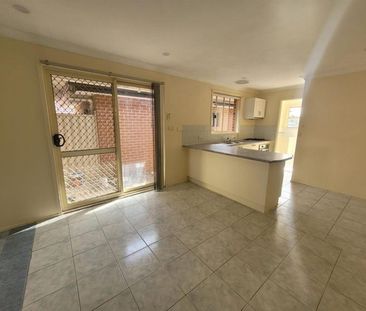 Well-Maintained 4 Bedroom Home - Photo 2