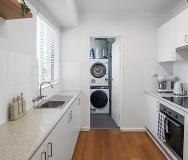Modern Comfort in a Convenient Coastal Setting - Photo 1