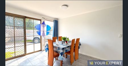 Spacious Family Home with Triple Garage and Large Shed! - Photo 3