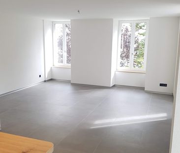 Charmant appartement de 3 pièces avec balcon au centre du village - Photo 1