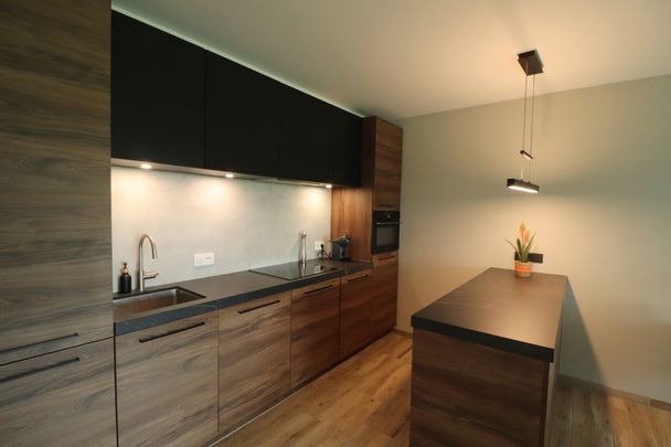 Energiezuinig 2-slaapkamer-appartement met lift, terras, ondergrondse autostaanplaats en kelderberging. - Photo 1