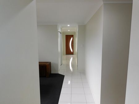 Partially Furnished 4 Bedroom Family Home with Solar - Photo 4