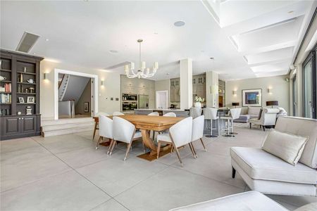 An exquisitely designed and finished double fronted detached house on an impressive plot and affording excellent lateral space and facilities, including a stunning indoor pool, gym and A/C. - Photo 4