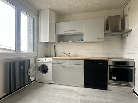 Appartement T2 - 59m2 avec balcon et garage - Photo 2